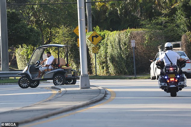 DJ Khaled is pulled over by police in Miami while riding in his golf cart barefoot and handling his phone (Photos)