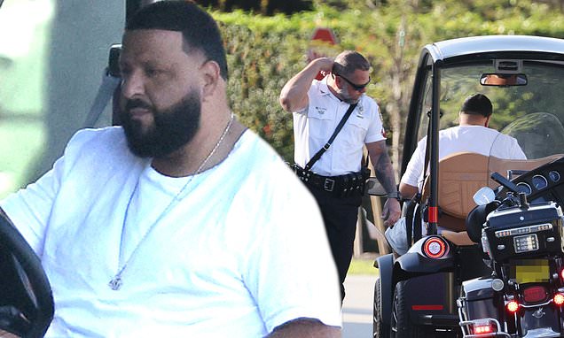 DJ Khaled is pulled over by police in Miami while riding in his golf cart barefoot and handling his phone (Photos)