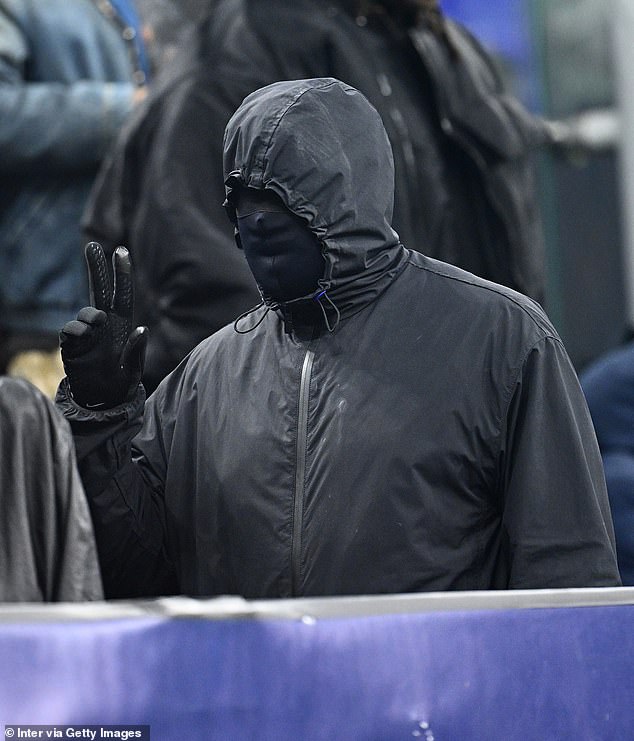 Kanye West wears a mask covering his entire face as he watches Inter Milan beat Atletico Madrid at the San Siro with wife Bianca and Ty Dolla $ign (Photos)