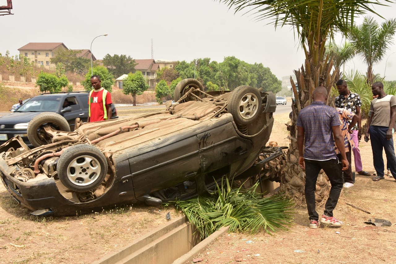 Driver and four passengers escape death as car somersaults in Abuja